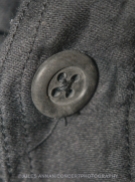 Close up of button on original Malcom McLaren and Vivienne Westwood black labelled Punk Rock "Parachute" shirt circa 1977